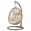 Fauteuil suspendu en métal et résine tressée beige, support style bohème, dimensions 105x105x195 cm, par Polvaken.