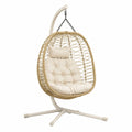 Fauteuil suspendu Polvaken en fibres tressées beige avec support en métal, dimensions 105x105x195 cm, confortable et élégant.